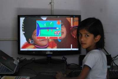 My niece playing Gcompris in Edubuntu